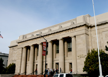 people on steps of the AF Bray Courthouse in Martinez, CA