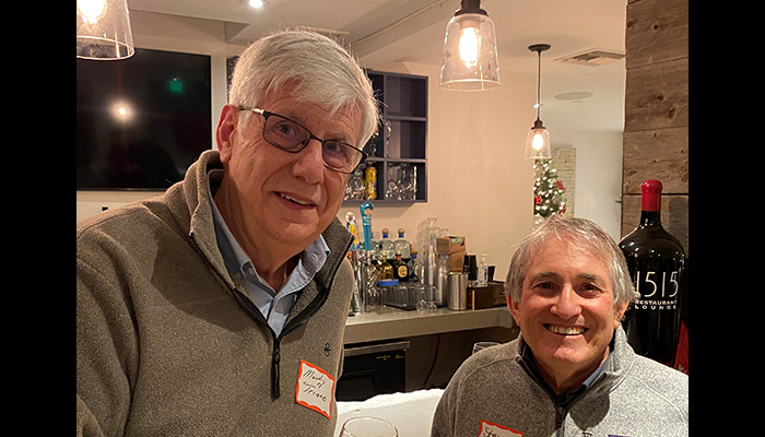 Marty Triano and Steve Mehlman at the 2021 holiday party for the Real Estate and Litigation Sections.