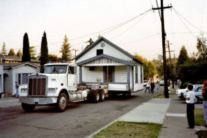house being moved by a truck