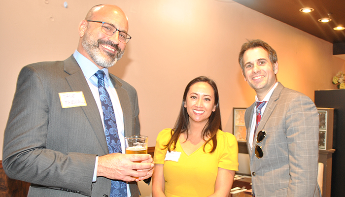 Attorneys Dave Parnall with Nicole Ramos Takemoto and Matt Talbot at CCCBA's Lunar New Year 2022 in Walnut Creek.