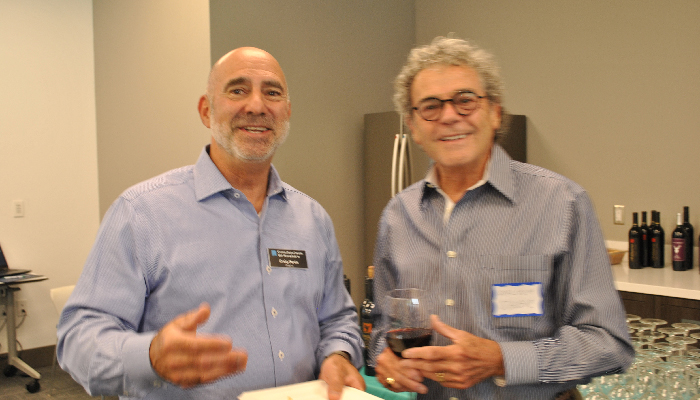Two men at cocktail party