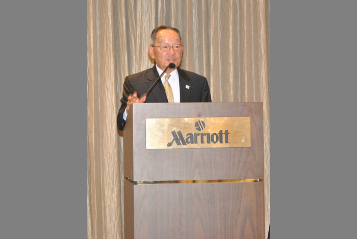 Justice Ming Chen at the poedium