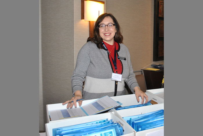 CCCBA Events Coordinator Sarah Marin at the check-in table.