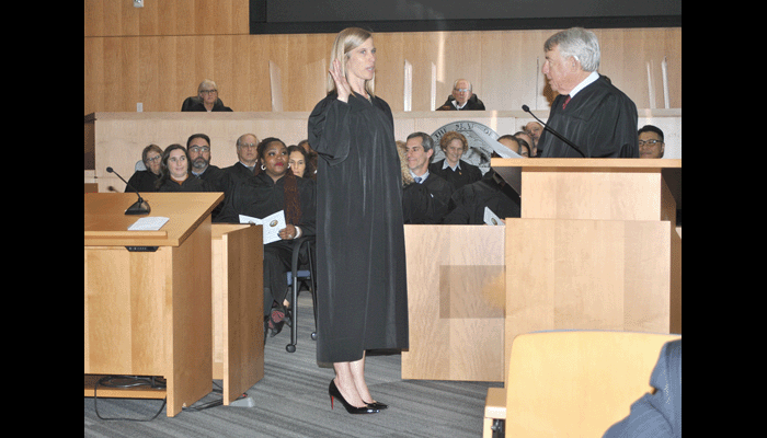 Judge Shara Beltramo takes the oath of office from Hon. Harry E. Hull, Associate Justice of the California Court of Appeal, Third Appellate District,