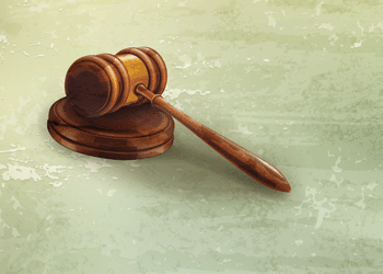 gavel on green background