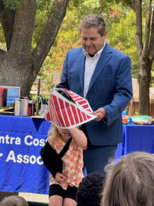 magician with young girl